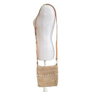 SONDRA ROBERTS Straw Crossbody Bag with Leather Strap and Pom Pom Accents